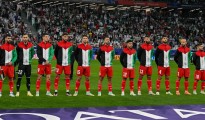 The Palestinian team is lining up during the national anthems before the AFC Asian Cup 2023 match between Iran and Palestine at Education City Stadium in Doha, Qatar, on January 14, 2023. (Photo by Noushad Thekkayil/NurPhoto via Getty Images)
