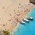 Τουρίστες  κάνουν μπάνιο δίπλα στο Ναυάγιο στην ομώνυμη παραλία της Ζακύνθου, την Κυριακή 3 Αυγούστου 2014.   Το Ναυάγιο, όπως αποκαλείται, της Ζακύνθου, είναι ένα ναυάγιο πλοίου που ξεβράστηκε σε μια απομονωμένη παραλία και σήμερα αποτελεί ένα από τα πιο ενδιαφέροντα αξιοθέατα του νησιού . Το ναυάγιο συνέβη το 1982, όταν το πλοίο Παναγιώτης, το οποίο ανήκε σε έναν Κεφαλλονίτη μετέφερε παράνομα τσιγάρα, από την Τουρκία σε διεθνή ύδατα, όπου θα τα πουλούσε σε προσυμφωνημένο σημείο. Το πλοίο, ωστόσο, λόγω εξαιρετικά δυσμενών καιρικών συνθηκών και χαλασμένης μηχανής, βρέθηκε εκτός πορείας και σύντομα έπεσε στα βράχια της βορειοδυτικής πλευράς της Ζακύνθου. Μέχρι τότε, η παραλία ονομαζόταν Άγιος Γεώργιος. Σήμερα, το ναυάγιο έχει προσαράξει στο κέντρο μιας απρόσιτης παραλίας, με αμμοχάλικο την οποία μπορεί να επισκεφθεί κανείς μόνο δια θαλάσσης και ελικοπτέρου καθώς είναι ένα από τα πιο διάσημα αξιοθέατα του νησιού. Χάρις στο δύσβατο της περιοχής, τα νερά της παραμένουν κρυστάλλινα και διάφανα μέχρι και σήμερα. Δευτέρα 4 Αυγούστου 2014. ΑΠΕ-ΜΠΕ /ΑΠΕ-ΜΠΕ/ΜΠΟΥΓΙΩΤΗΣ ΕΥΑΓΓΕΛΟΣ
